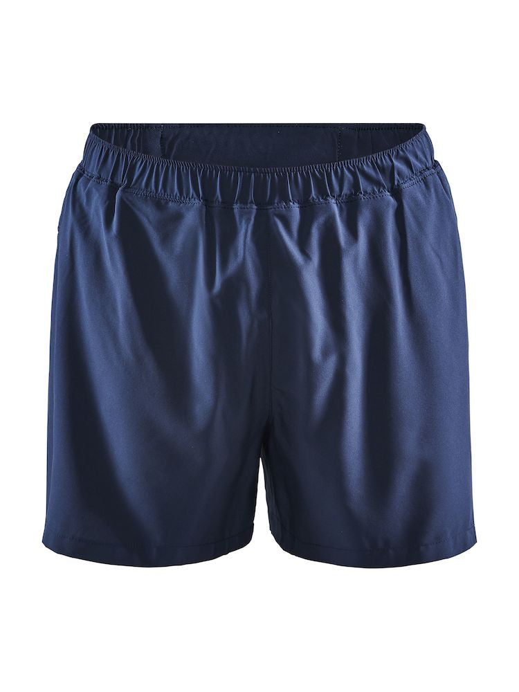 A pair of navy blue athletic shorts lays flat against a white background.