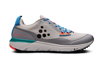 Gray and teal Craft Trail ADV running shoe with bright blue laces against a black background.