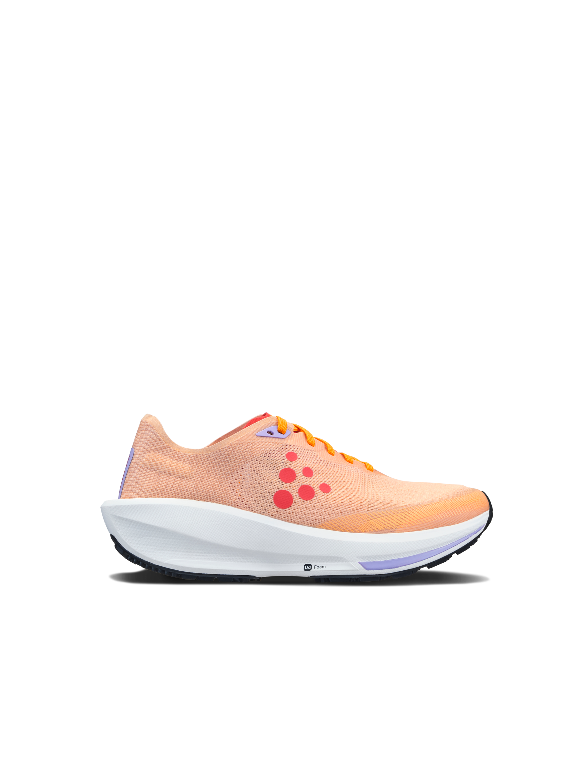 Peach-colored running shoe with white sole and orange laces displayed at a side angle.