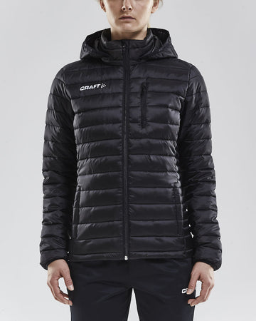 Woman models a black, quilted puffer jacket with a hood, ideal for winter sports or casual wear.