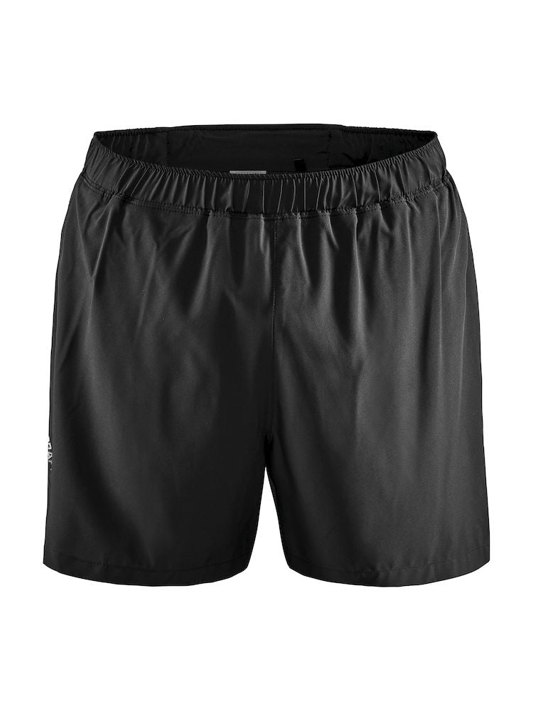 Black athletic shorts with elastic waistband on white background.