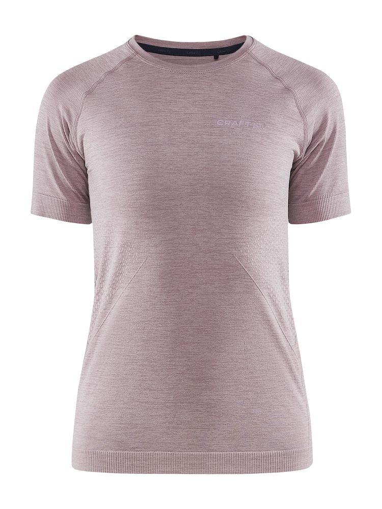 A woman's mauve Craft sports t-shirt, showcasing its breathable, athletic design on a white background.