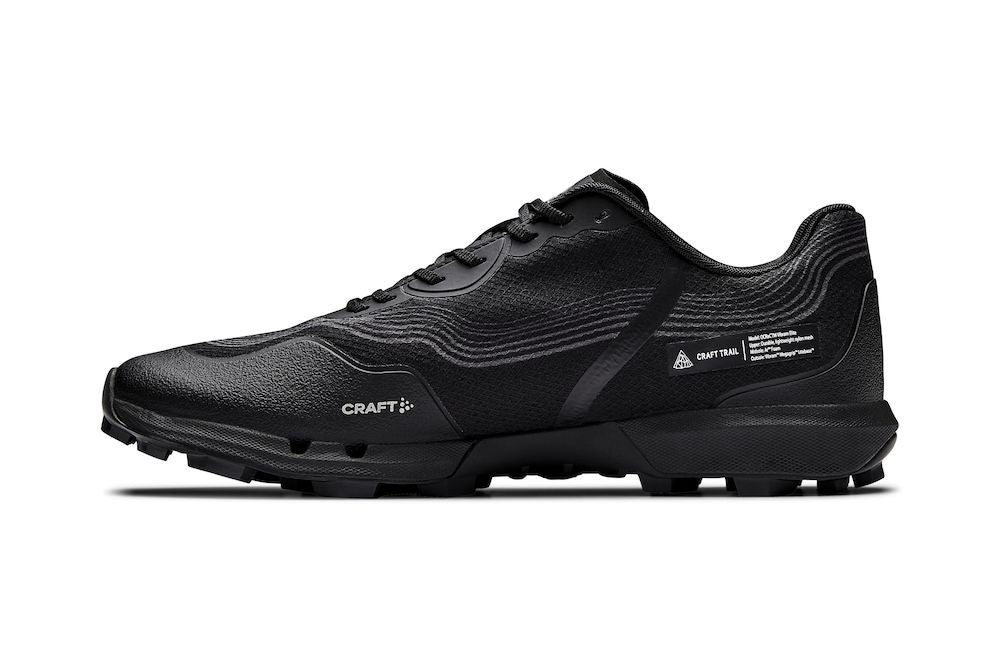 Black Craft Trail running shoe with textured upper and rugged outsole, shown from the side.