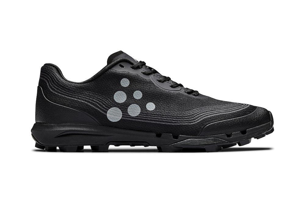 Black trail running shoe with textured upper and rugged outsole.