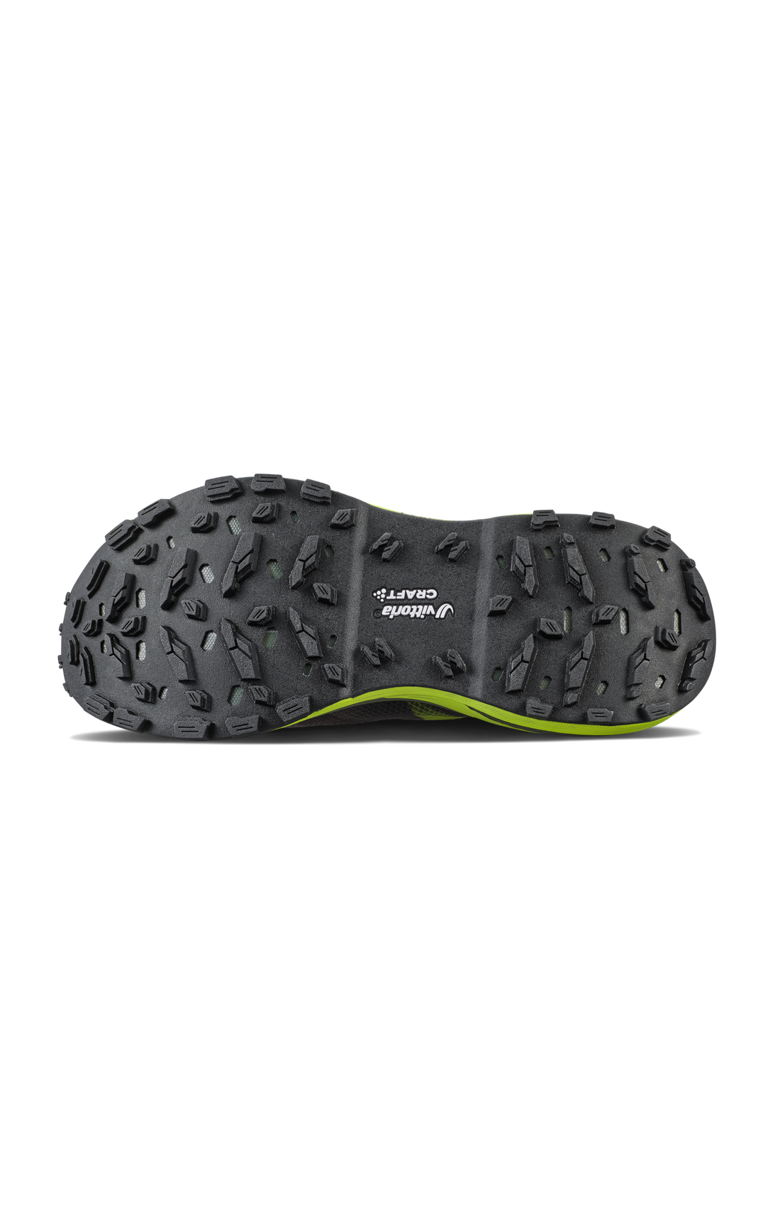 Black and green trail running shoe outsole featuring Vibram Megagrip tread for superior grip. 
